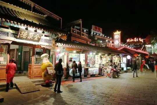 Quanjude Roast Duck Restaurant and Beijing local food stalls and gifts shops.