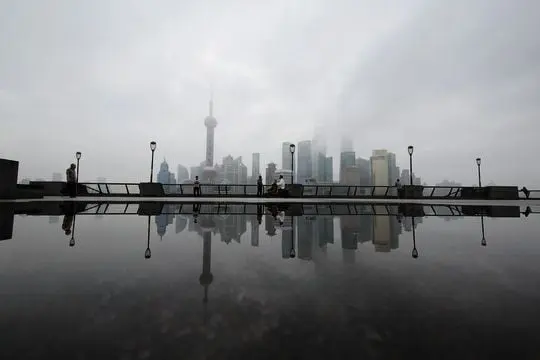 Rainwater reflections of Pudong Skyline on the Bund (1)