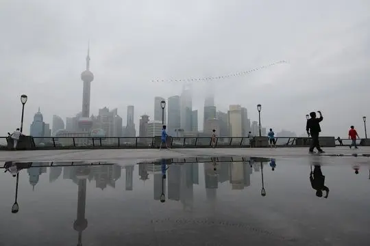 Rainwater reflections of Pudong Skyline on the Bund (5)