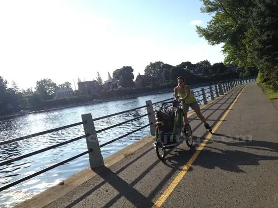 Skating with her dog along the shared cycle and pedestrian pathways