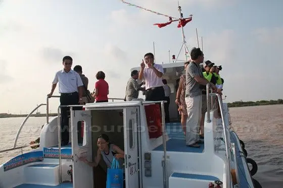 Some of our group members are out on the open deck to have a clear view of the Yellow River
