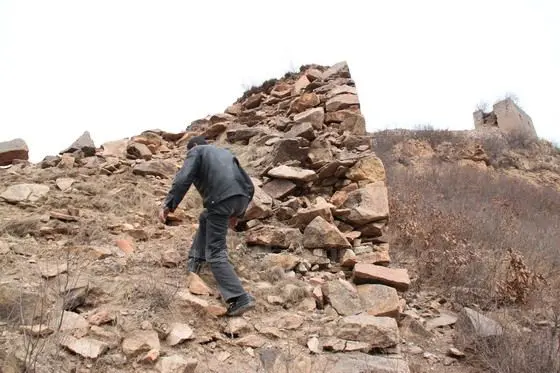 Start our hike along a pile of stones