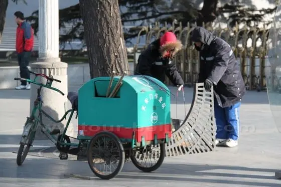 Street cleaners are at work in the coldest weather