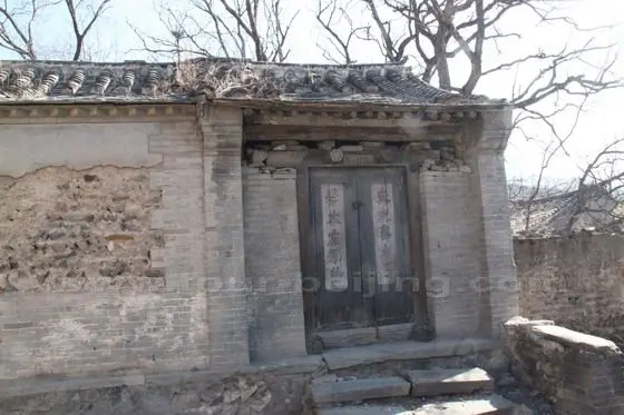 The Mao's slogan was still visible on the door - For agriculture, learn from Dazhai; for industry, learn from Daqing.