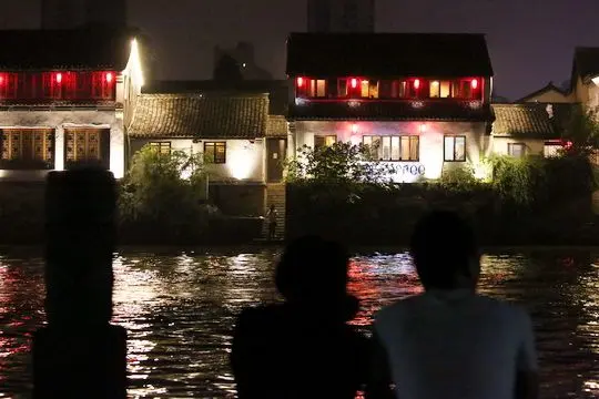 The Neon-lit waterfront bars and restautants