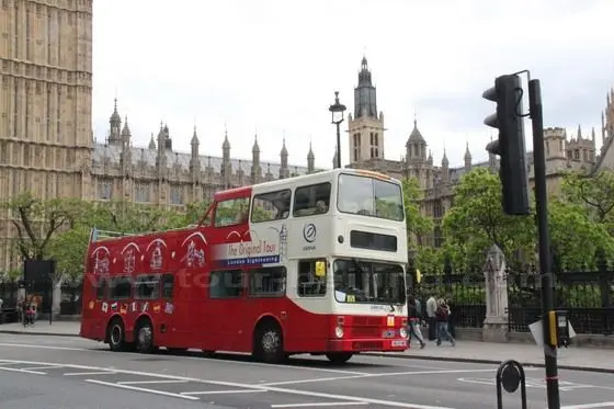 The Orignal Bus is passing by the Big Ben