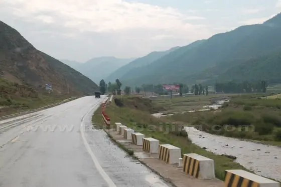 The Tao River originating from Luqu County runs parallelled by the highway