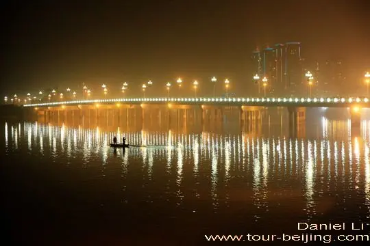The brightly lit Qingyi River Bridge
