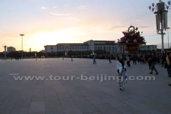 The eastern side of the square is brightened by the rising sun.