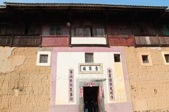 The entrance to the square Kuijulou tulou building