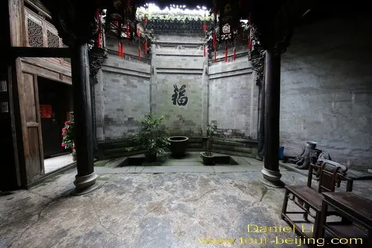 The front hall with a small yard