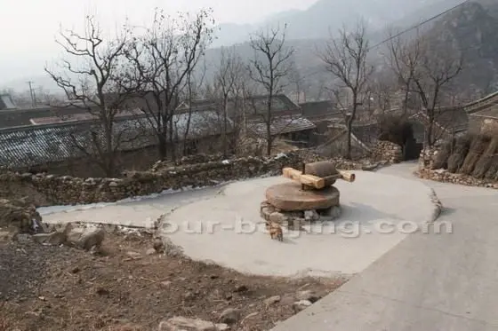 The grind stone in the village.