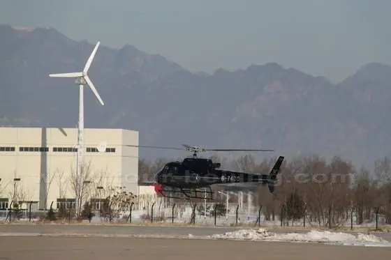 The helicopter is taking off the ground