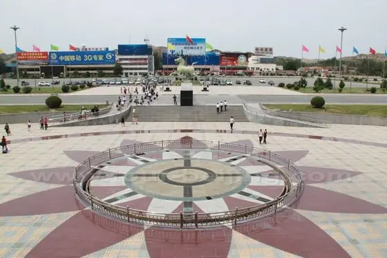 The large square in front of the two-storey main terminal is the parking place for private vehicles.