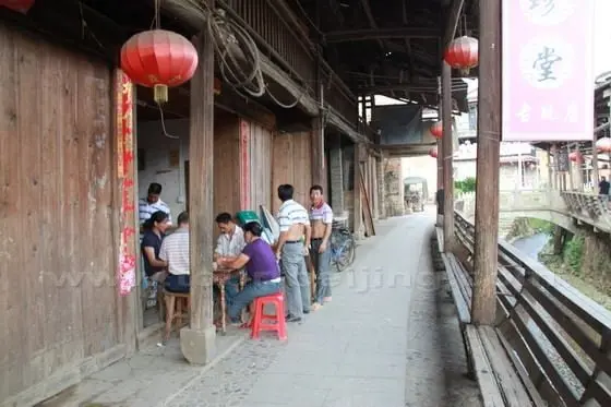 The local villagers are playing cards.