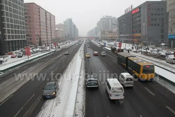 The main street with pavement anti-freezing agent