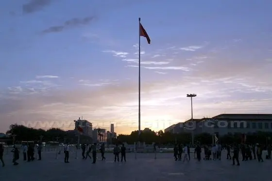 The national flag with a backdrop of the rising sunlights.