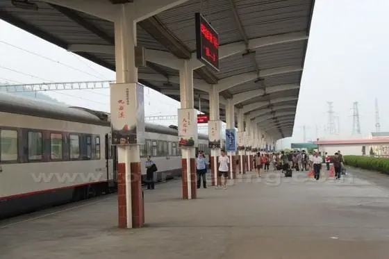 The pillars on the platform are all cirled with commercial signboards.