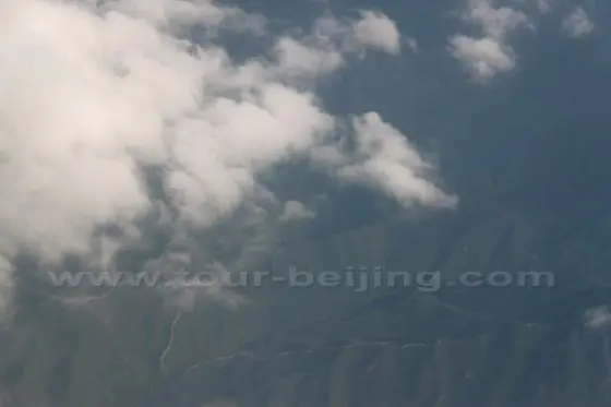 The rolling Great Wall is below us.