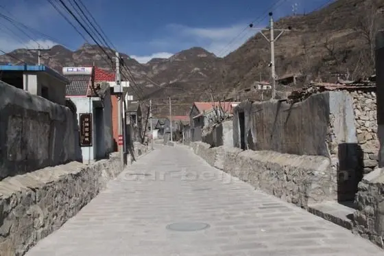 The village houses are orderly arranged on the both sides of the main street in the village.