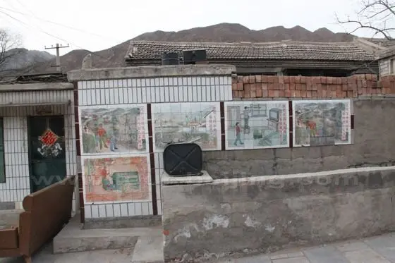 The village tiled mural telling the villagers how to deal with electricity for personal safety.
