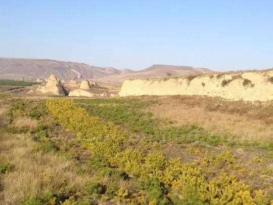 The wall mostly made of earth tamped down