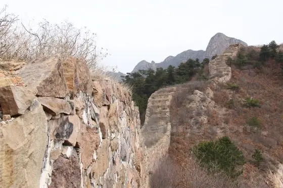 The wall was built of rocks from local mountains