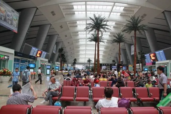 There are totally two parallel 24 check-in gates in the middle of the hall from south to north