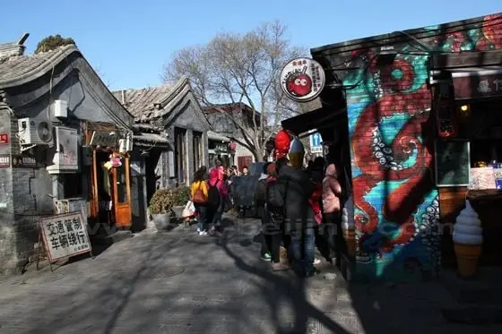 Traditional grey-colored builings lined along the lane