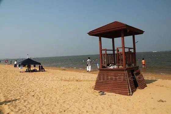 Two simple pavilions on the beach