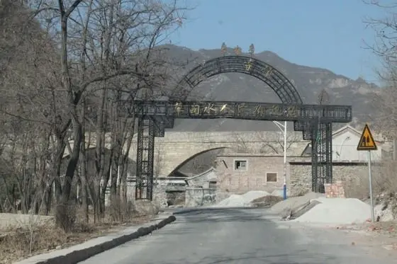 Very soon we drove by Caodianshui Village along the mountain road.