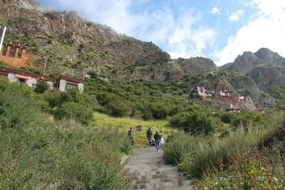 We are climbing on the steps leading to the first temple