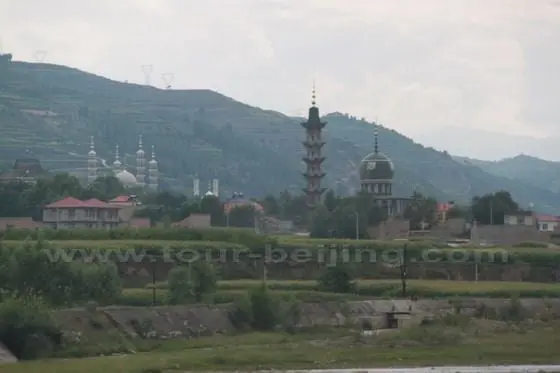 We are driving from the loess plateau to the fringe of Tibetan-Qinghai Plateau and passing from Muslim culture to Tibetan culture.