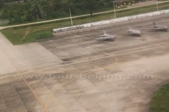 We are flying over a squad of fight planes.