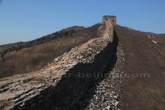 We are walking on the wild and damaged wall to the first fort on the west section.