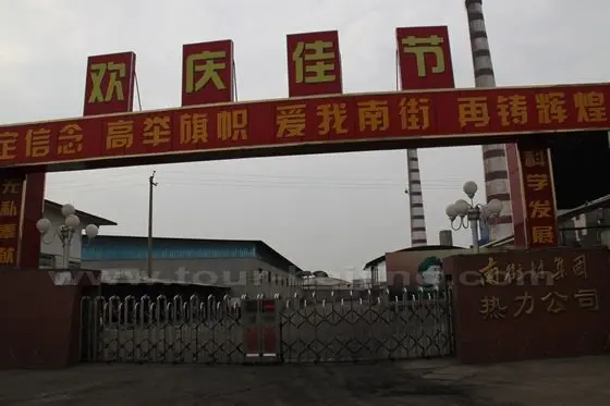 We drive past Nanjiecun Gas Company.