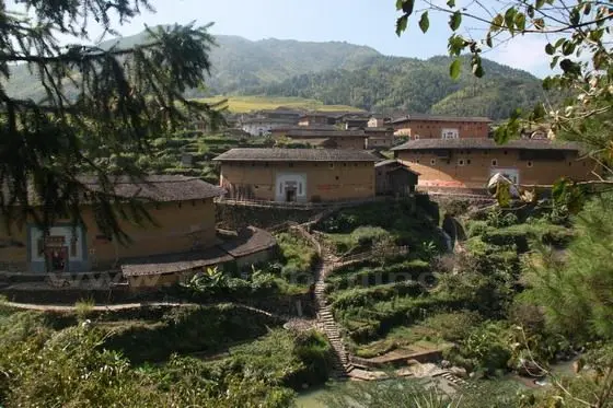 We follow a local village guide to the Chuxi Tulou Cluster.