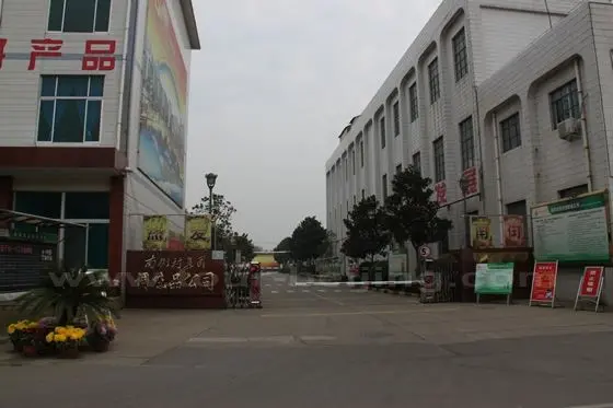 We pass by Nanjiecun's Favoring Factory.