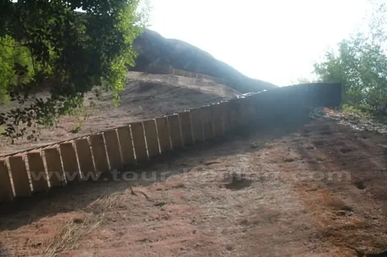 We walked down along the cemented ladders attached to the rock.