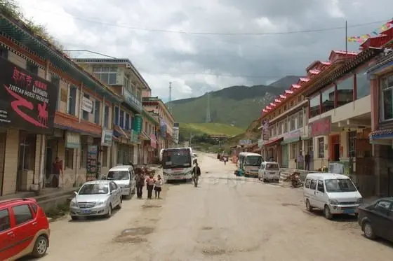 We were passing through the only street in the Langmusi Town