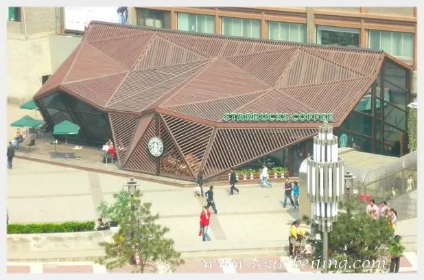 To the northwest of the Bell Tower, there is Starbucks Coffee