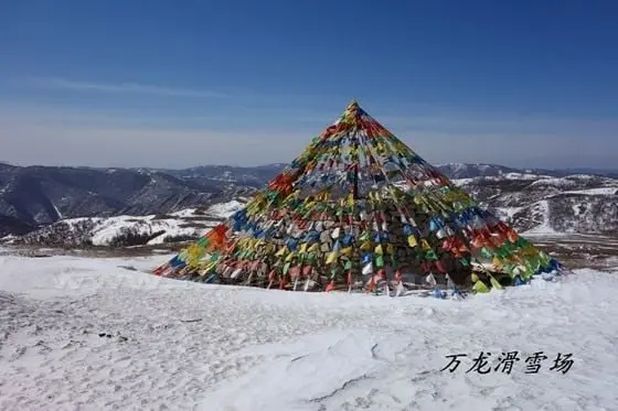 a cone-shaped solid tower of stons atop the hill