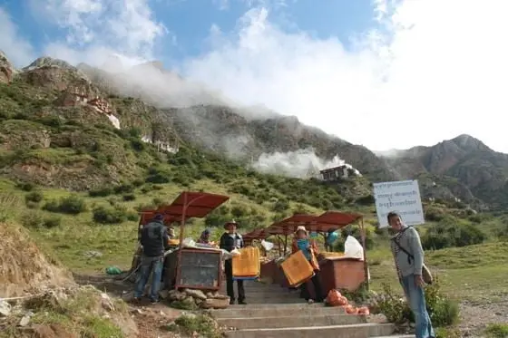 a few local Tibetan vendors waiting for us on the path selling prayer flags