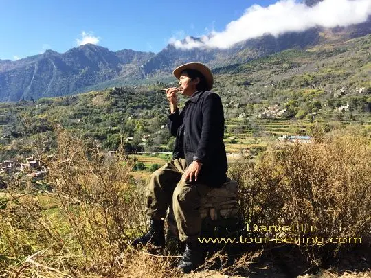 smoking and enjoying his bucolic life