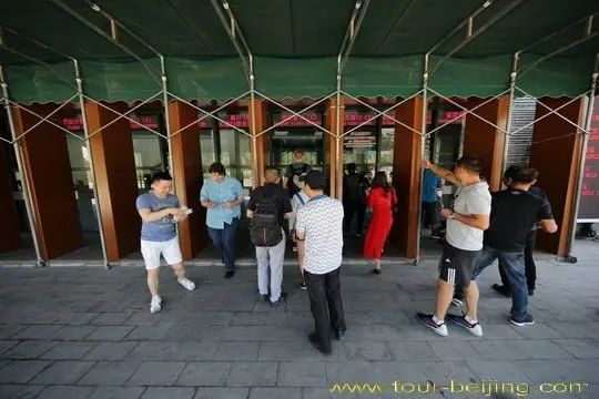 Wait in line at Ticketing Box Offices