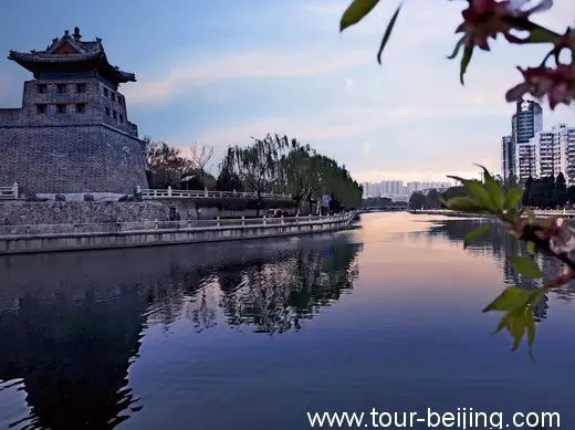 The magnificent View of the Corner Tower over the city moat.