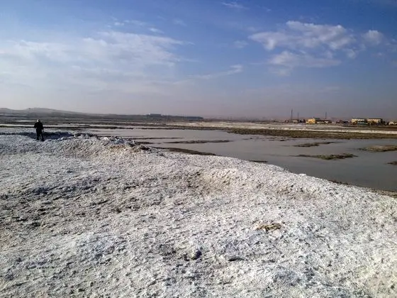 The salt lake glistering under the sunshine.