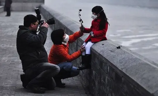 We must live through smog and have fun in life.