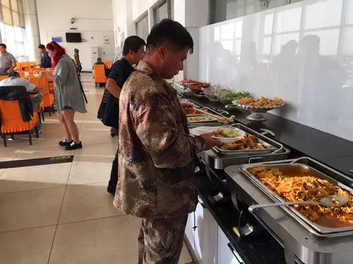 A rich choices of food and dishes for the buffet.