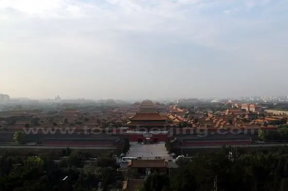 the massive Forbidden City looking brilliantly under a radiant rising sun.
